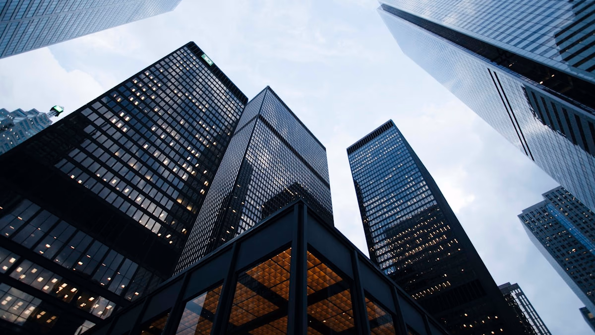 A modern corporate skyline representing the changing landscape of work and the global economy.