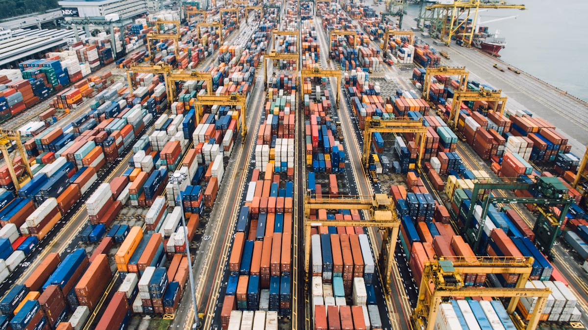 A highly automated factory floor with robotic arms and AI-driven control systems, representing China's 2030 manufacturing vision.