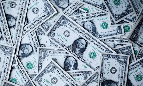 A person's silhouette made of binary code, representing a digital footprint.