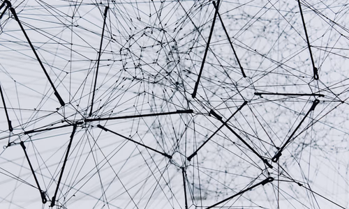 A complex network of interconnected nodes representing a content cluster, glowing with digital energy against a dark, sovereign background.