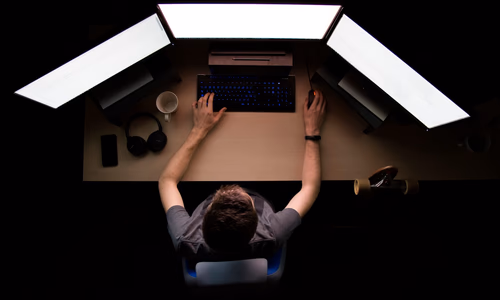 A Raspberry Pi connected to a router, with a digital shield overlay representing network-wide protection and ad-blocking.