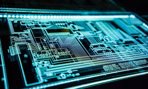A security analyst stares at cascading lines of green code on multiple monitors in a dark operations center, with network topology diagrams visible in the background — representing the AI-powered vulnerability discovery capabilities of Claude Mythos Preview, which identified thousands of critical zero-day flaws in every major operating system and browser as part of Anthropic's Project Glasswing cybersecurity initiative.