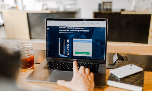 A wide-angle shot of a major financial district skyline at dusk with glass towers reflecting golden light, representing the unprecedented concentration of AI investment capital flowing between companies that are simultaneously partners, customers, and competitors — illustrated by Google, Amazon, and Microsoft all holding major stakes in Anthropic while building rival AI products.