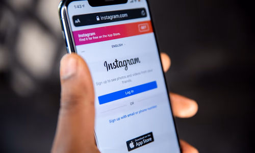 Close-up of a broken padlock with shattered metal pieces symbolizing the removal of end-to-end encryption protection, representing Meta's decision to dismantle Instagram's privacy safeguards and expose user messages to corporate surveillance and AI training.