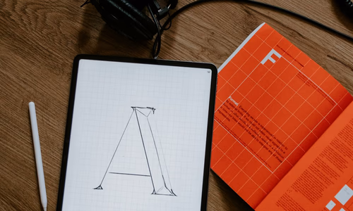Apple logo illuminated against a dark background representing Apple's 50th anniversary on April 1 2026