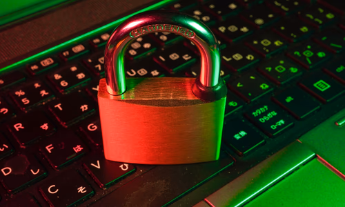 A digital padlock and key representing the comparison between Bitwarden and 1Password password managers in 2026