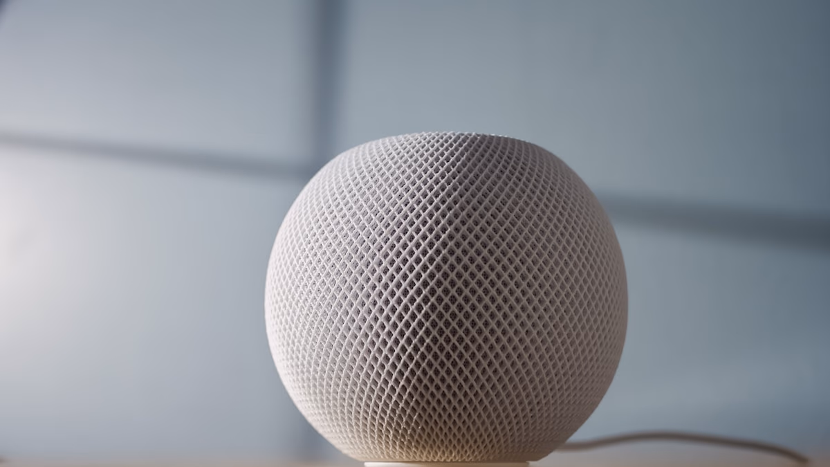 A sleek, minimalist smart home setup with a focus on high-end audio and television hardware.