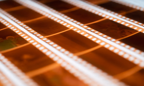 Film strips and video frames representing Meta's Muse Spark AI video generation model launched April 2026