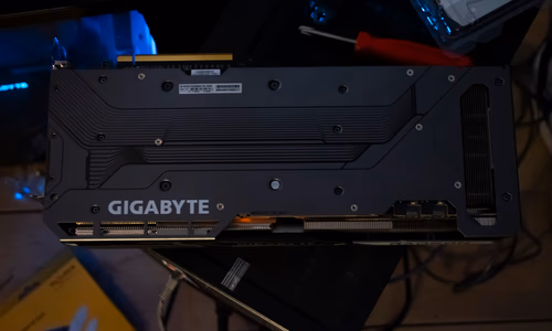 A high-tech server rack with glowing blue lights, representing the advanced AI infrastructure at the center of the Supermicro smuggling scandal.