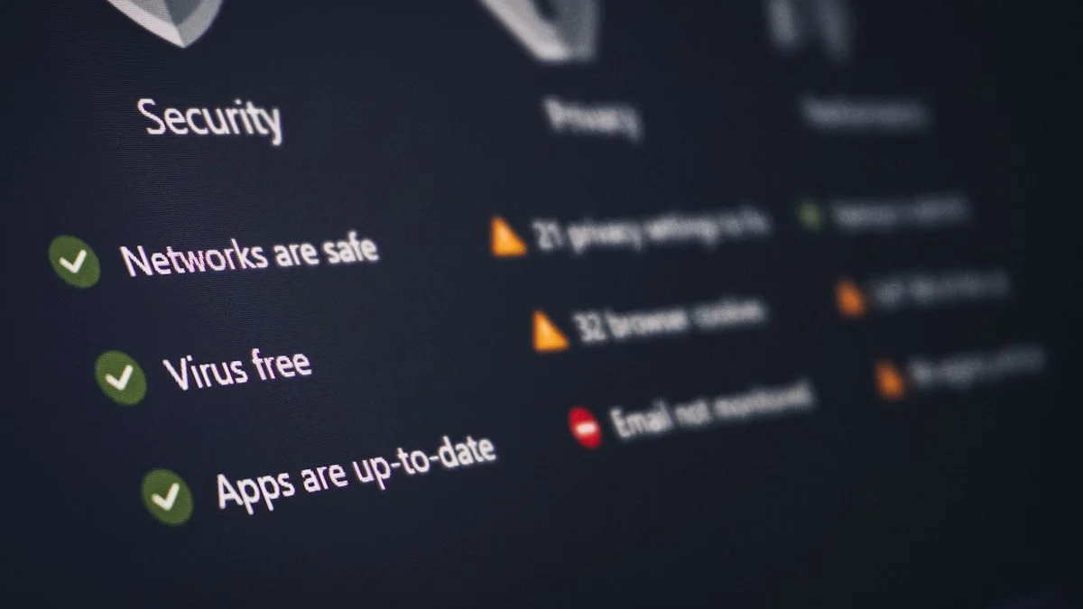 A digital shield filtering incoming messages, representing the use of burner emails and phone numbers to block spam and trackers.