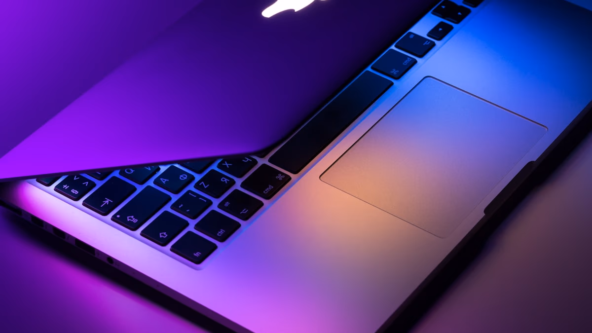 MacBook Pro laptop on a desk representing the upcoming Apple M6 chip MacBook Pro redesign expected in late 2026
