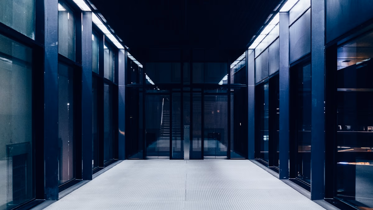 A close-up of server racks with glowing blue lights, representing cloud and chip investment.