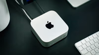 Close-up of Apple M5 chip with lock icon overlay symbolizing broken security