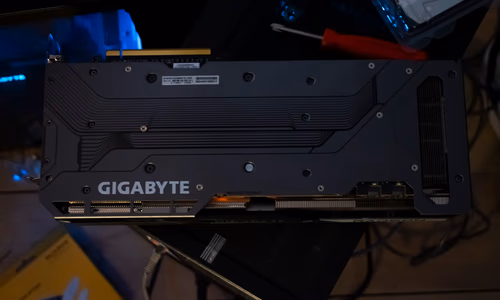 A high-tech server rack with glowing blue lights, representing the advanced AI infrastructure at the center of the Supermicro smuggling scandal.